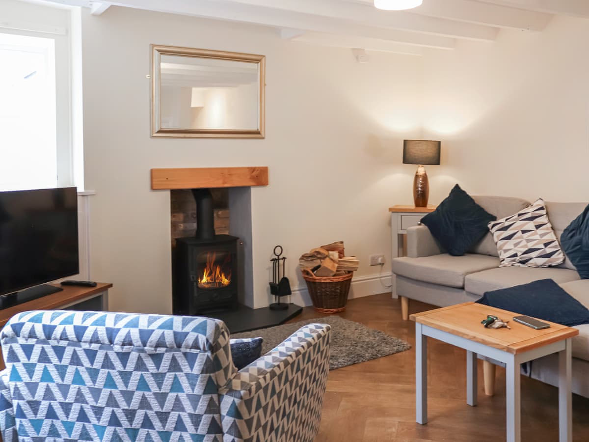 Lounge seating around the cottage wood burner