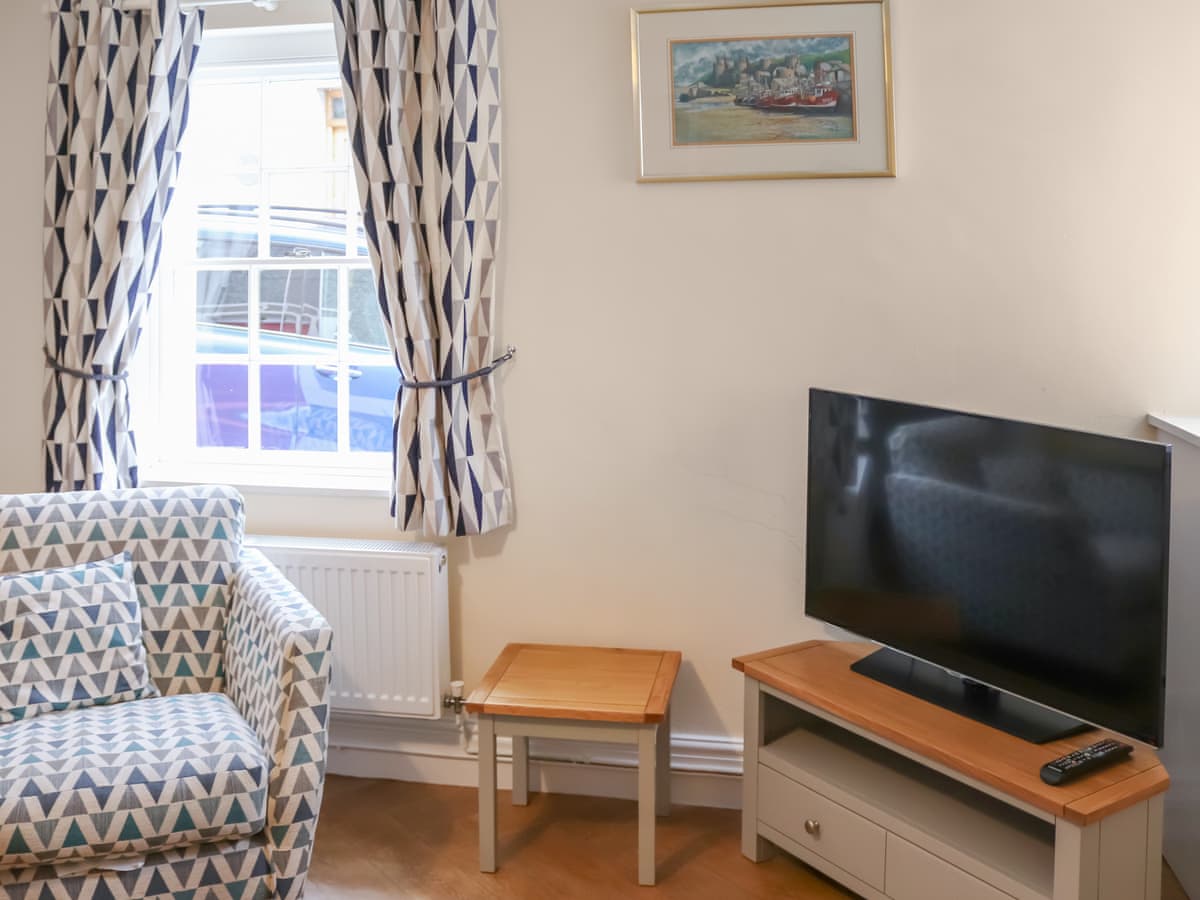 Lounge window, chair and Smart TV